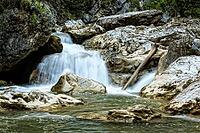 Raging clean fresh mountain river flowing between rocks [IBR123878907]