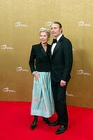 Mads Mikkelsen with woman Hanne Jacobsen, EUROPEAN FILM AWARDS Berlin 2026, photo call at the House of World Cultures, Berlin, 17.01.2026 [IBR112941832]