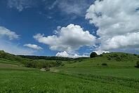 Cluster clouds (cumulus) over the landscape in the southern Carpathian Arc, Romania [IBR123990972]
