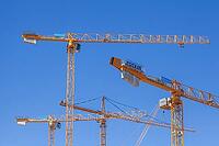 Construction cranes in the Überseestadt of Bremen, scaffolding, construction site, Bremen [IBR123999823]