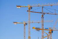 Construction cranes in the Überseestadt of Bremen, scaffolding, construction site, Bremen [IBR123999824]