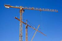 Construction cranes in the Überseestadt of Bremen, scaffolding, construction site, Bremen [IBR123999827]