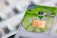 Electronic health card, health insurance card with tablets, medicine, close-up, studio shot, Germany [IBR123999884]