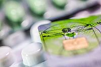 Electronic health card, health insurance card with tablets, medicine, close-up, studio shot, Germany [IBR123999886]