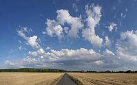 Dirt road with clouds [IBR124051657]