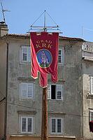Flag on the market square in Krk, City [IBR124051679]
