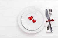 Romantic table setting on white wooden table.Valentine's day card template [IBR124084197]