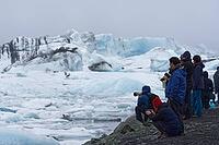 Tourists at Jökulsárlón, Jökulsárlón, South Iceland, Iceland [IBR124192799]