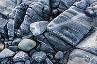 Rock structures on the coast, Söröya, Finnmark, Norway, February 2019 [IBR124200484]