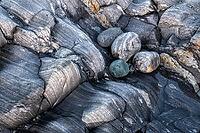Rock structures on the coast, Söröya, Finnmark, Norway, February 2019 [IBR124200486]