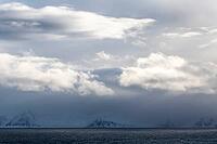 Dramatic lighting over the Norwegian European Sea, Söröya, Finnmark, Norway, March 2019 [IBR124200491]
