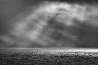 Dramatic lighting over the Norwegian European Sea, Söröya, Finnmark, Norway, March 2019 [IBR124200493]