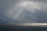 Dramatic lighting over the Norwegian European Sea, Söröya, Finnmark, Norway, March 2019 [IBR124200494]
