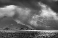 Dramatic lighting over the Norwegian European Sea, Söröya, Finnmark, Norway, March 2019 [IBR124200496]