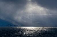 Dramatic lighting over the Norwegian European Sea, Söröya, Finnmark, Norway, March 2019 [IBR124200498]