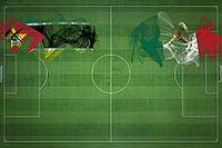 Mozambique vs Mexico Soccer Match, national colors, national flags, soccer field, football game, Competition concept, Copy space [IBR124240930]