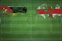 Mozambique vs England Soccer Match, national colors, national flags, soccer field, football game, Competition concept, Copy space [IBR124240932]