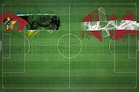 Mozambique vs Denmark Soccer Match, national colors, national flags, soccer field, football game, Competition concept, Copy space [IBR124240933]