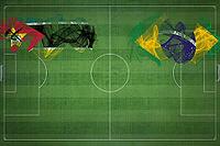 Mozambique vs Brazil Soccer Match, national colors, national flags, soccer field, football game, Competition concept, Copy space [IBR124240934]