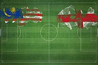 Malaysia vs England Soccer Match, national colors, national flags, soccer field, football game, Competition concept, Copy space [IBR124240977]