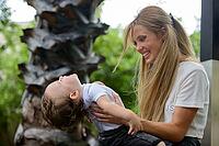 Portrait of young beautiful blonde mother with adorable young baby son together [IBR124309012]