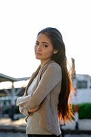 Portrait of young beautiful Asian woman at the railway station [IBR124309029]