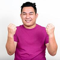 Studio shot of young handsome overweight Filipino man against white background [IBR124309033]