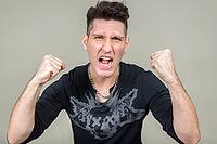 Studio shot of young multi ethnic man against white background [IBR124309058]