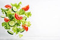 Fresh lettuce leaves, tomatoes and cucumbers float in the air, healthy food, AI generates, AI generated [IBR124458886]
