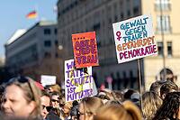 Berlin, Germany - 22.3.2026: Demonstrators, including one holding up a poster with the inscription: - Violence against woman endangers democracy - protesting in front of the Brandenburg Gate under the theme Demonstration against sexualized digital violenc [IBR113108128]