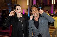 Katharina Gerhardt and Falk-Willy Wild in front of the German Audio Film Awards ceremony at the Colosseum cinema in Berlin on 24.03.2026 [IBR113108133]