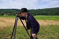 Living History Event at the Hohenloher Open Air Museum, Hohenlohe, Wackershofen, geographer, surveying technology, land survey, farm museum, rural life, Swabian-Franconian Forest nature park Park, Schwäbisch Hall, Hohenlohe, Germany [IBR124469140]