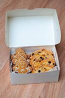 Festive gingerbread cookies with biscotti slices arranged in a box, ideal for holiday gifting [IBR124491567]