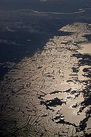 Greenhouses and intensive agriculture in the Nile Delta on Lake Burullus, Egypt [IBR124494820]