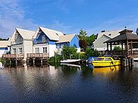 Charter boats and holiday homes in Marina Wolfsbruch, Rheinsberg, Brandenburg, Germany [IBR124494834]