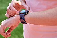 Woman use fitness watch before cardio exercises, Checking results on smart watch after training, Healthy lifestyle concept [IBR124497449]