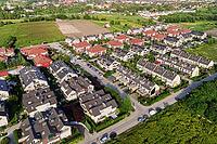 Aerial view of suburban neighborhood, Residential district with houses and streets in small european town [IBR124497451]