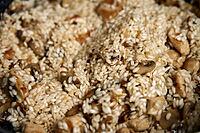 Process of cooking risotto. Arborio rice in frying pan at home kitchen. Italian cuisine dish [IBR124497468]