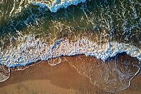 Sand beach with sea waves, top view. Summer vacation and travel concept. Beautiful coastline with baltic sea and sand beach, aerial view [IBR124497499]
