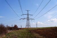 Electricity pylons conducting current from distribution power station, blackout and grid stability concept, copy space [IBR124525386]