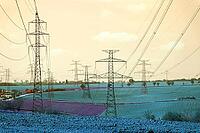 Electricity pylons conducting current from distribution power station, blackout and grid stability concept, copy space [IBR124525407]
