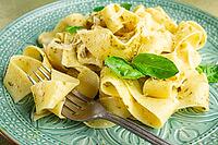 Pasta papardelle, with pesto and parmesan cheese, homemade, no people [IBR124552188]