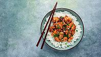 Fried chicken teriyaki with rice, green onion and sesame, homemade, no people [IBR124552191]