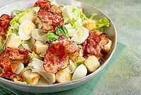 Caesar salad with fried bacon, quail eggs, homemade, no people [IBR124552216]