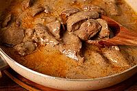 Beef stroganoff, pan cooking, close-up, homemade [IBR124552223]