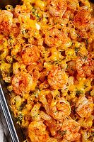 Pasta with shrimp and cheese, with a golden crust, cooked in a baking dish, homemade, no people [IBR124552224]