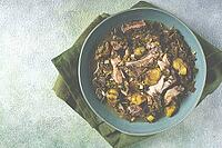 Chakapuli, Georgian dish, stewed meat with herbs and tkemali, in white wine, homemade, no people [IBR124552249]