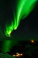 Northern Lights (Aurora borealis) over the Norwegian Sea, S$00F6r$00F6ya, Finnmark, Norway, December 2018 [IBR124563532]