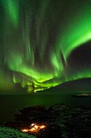 Northern Lights (Aurora borealis) over the Norwegian Sea, S$00F6r$00F6ya, Finnmark, Norway, December 2018 [IBR124563541]