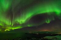 Northern Lights (Aurora borealis) over the Norwegian Sea, S$00F6r$00F6ya, Finnmark, Norway, December 2018 [IBR124563542]